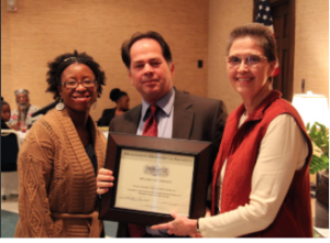 Professor Jodi Skipper (left) receives the Mississippi Historical Society award.